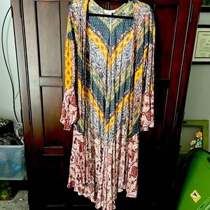 Umgee women’s boho duster with bell sleeves.